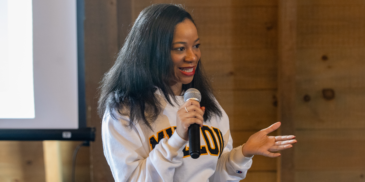 Chandra Donelson speaks at an event