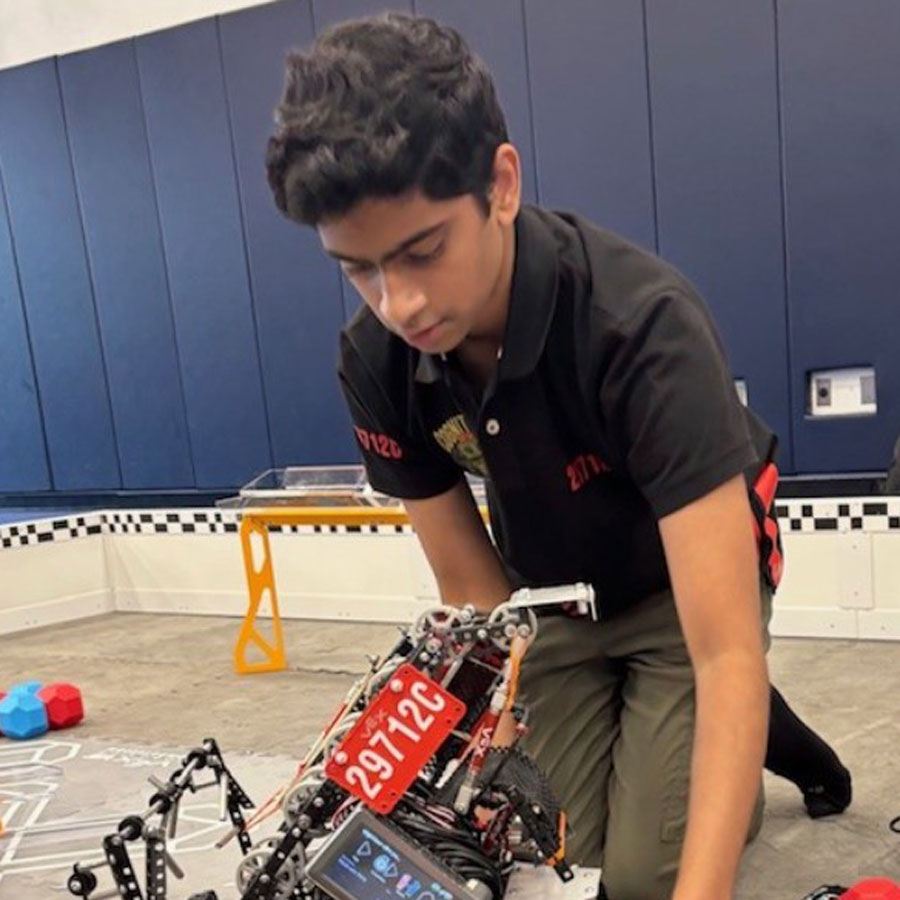 Student works on his robot